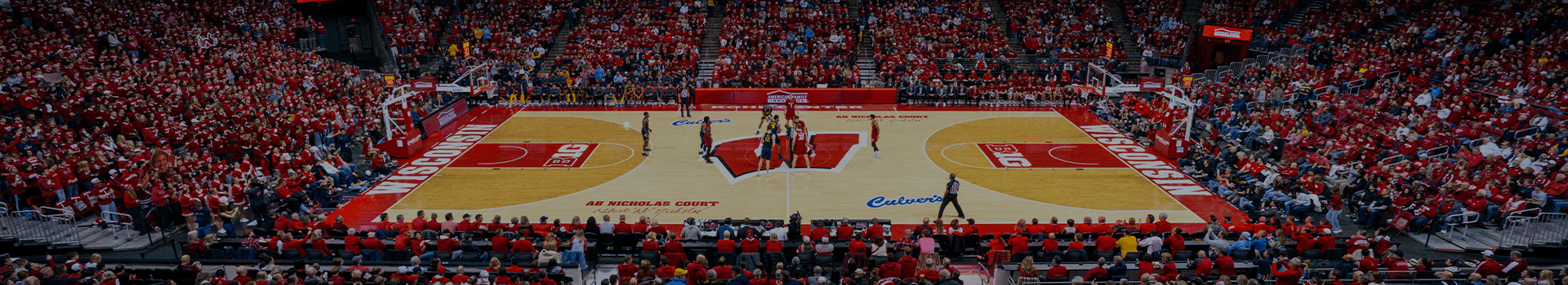 //assets.onlocationexp.com/prod/images/2026%20Wisconsin%20Mens%20Basketball%20Banner.png
