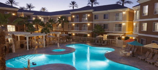 //assets.onlocationexp.com/prod/images/Homewood-Suites-LQ-Exterior.png