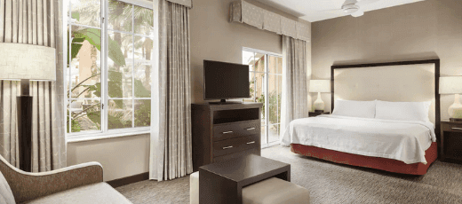 //assets.onlocationexp.com/prod/images/Homewood-Suites-LQ-Room.png