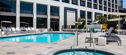 //assets.onlocationexp.com/prod/images/Beverly Hills Marriott Pool.jpeg