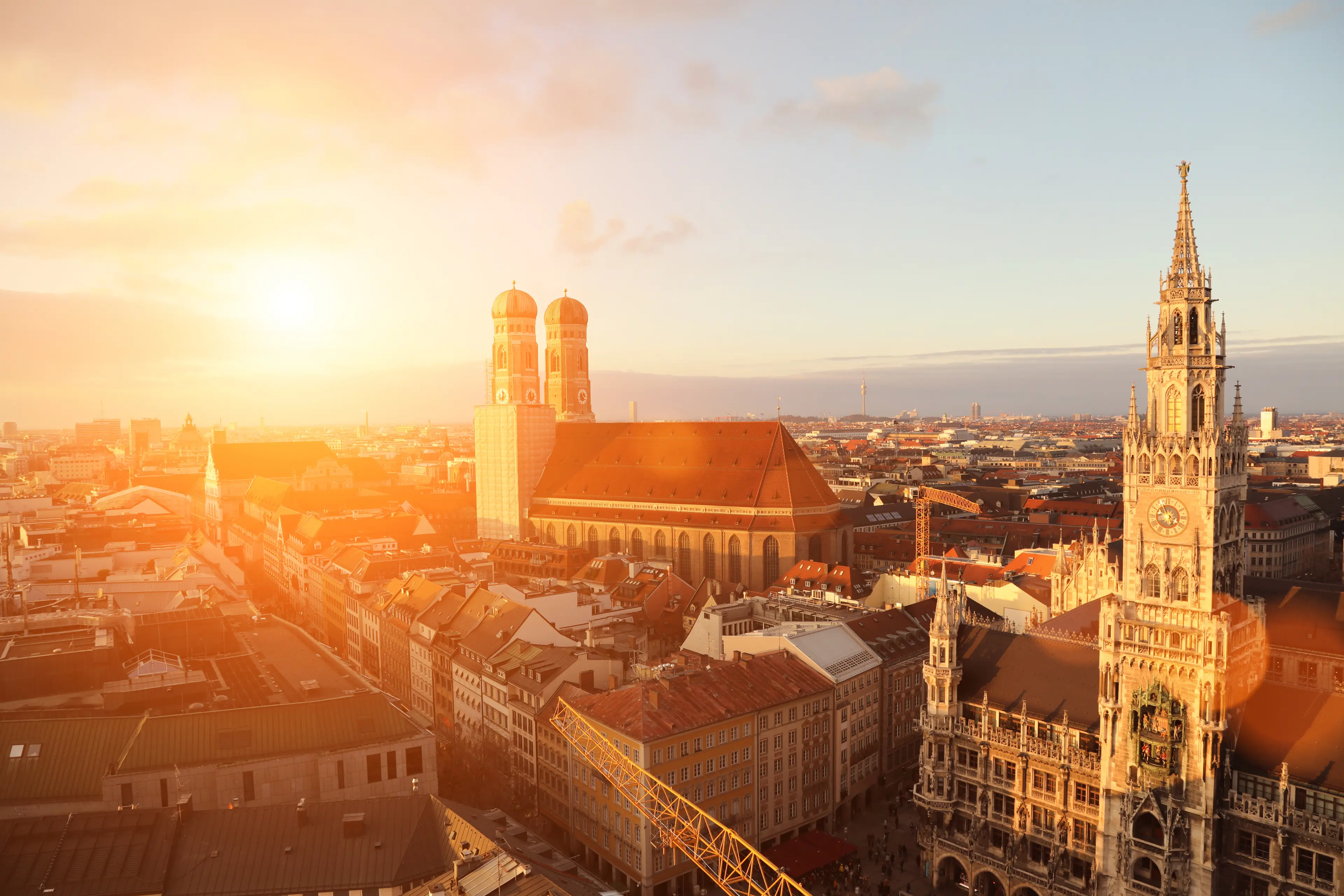 //assets.onlocationexp.com/prod/images/Munich Skyline Sunset.jpg